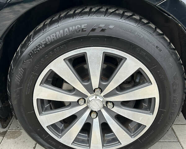 Черный Киа Рио, объемом двигателя 1.4 л и пробегом 111 тыс. км за 7500 $, фото 7 на Automoto.ua