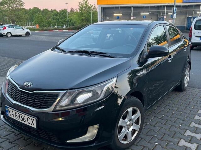 Черный Киа Рио, объемом двигателя 1.4 л и пробегом 190 тыс. км за 6600 $, фото 2 на Automoto.ua