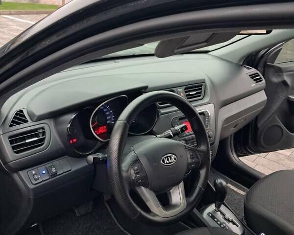 Черный Киа Рио, объемом двигателя 1.4 л и пробегом 244 тыс. км за 6900 $, фото 15 на Automoto.ua