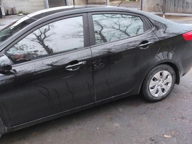 Черный Киа Рио, объемом двигателя 1.4 л и пробегом 94 тыс. км за 6500 $, фото 4 на Automoto.ua