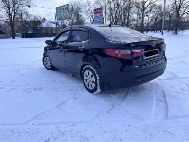 Черный Киа Рио, объемом двигателя 1.4 л и пробегом 160 тыс. км за 7200 $, фото 1 на Automoto.ua