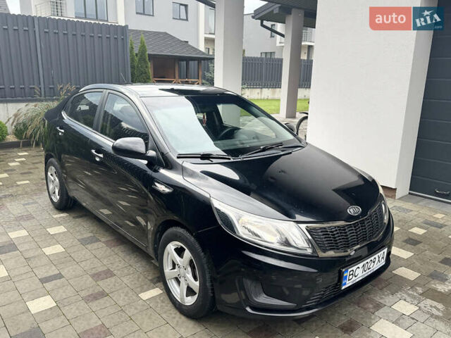 Чорний Кіа Ріо, об'ємом двигуна 1.4 л та пробігом 199 тис. км за 5999 $, фото 10 на Automoto.ua