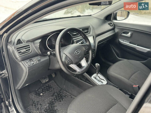 Черный Киа Рио, объемом двигателя 1.4 л и пробегом 155 тыс. км за 7500 $, фото 22 на Automoto.ua