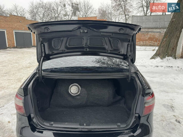 Черный Киа Рио, объемом двигателя 1.4 л и пробегом 155 тыс. км за 7500 $, фото 33 на Automoto.ua