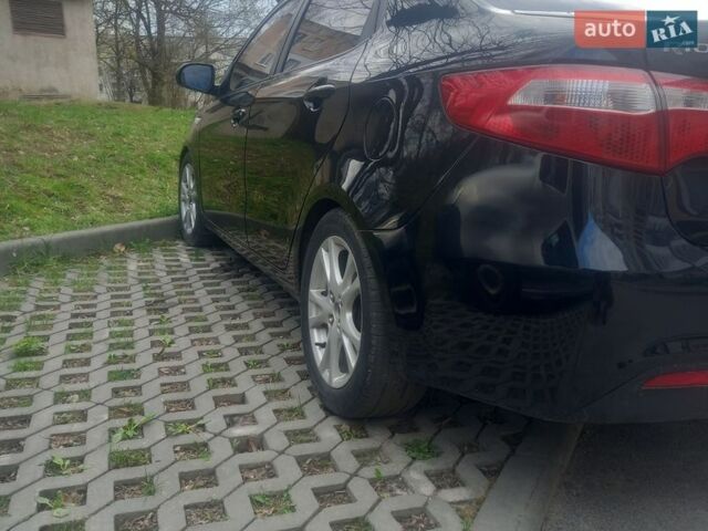 Черный Киа Рио, объемом двигателя 1.4 л и пробегом 213 тыс. км за 8700 $, фото 22 на Automoto.ua