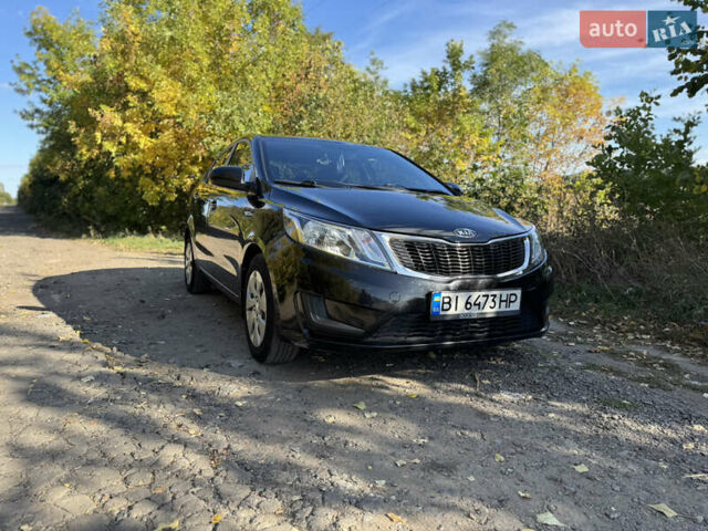 Черный Киа Рио, объемом двигателя 1.4 л и пробегом 173 тыс. км за 7300 $, фото 7 на Automoto.ua