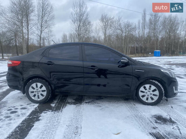 Черный Киа Рио, объемом двигателя 1.59 л и пробегом 249 тыс. км за 6900 $, фото 3 на Automoto.ua