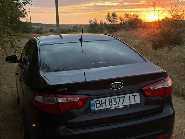 Чорний Кіа Ріо, об'ємом двигуна 1.6 л та пробігом 104 тис. км за 8500 $, фото 12 на Automoto.ua