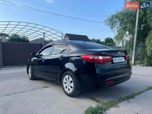 Чорний Кіа Ріо, об'ємом двигуна 1.4 л та пробігом 178 тис. км за 7800 $, фото 4 на Automoto.ua