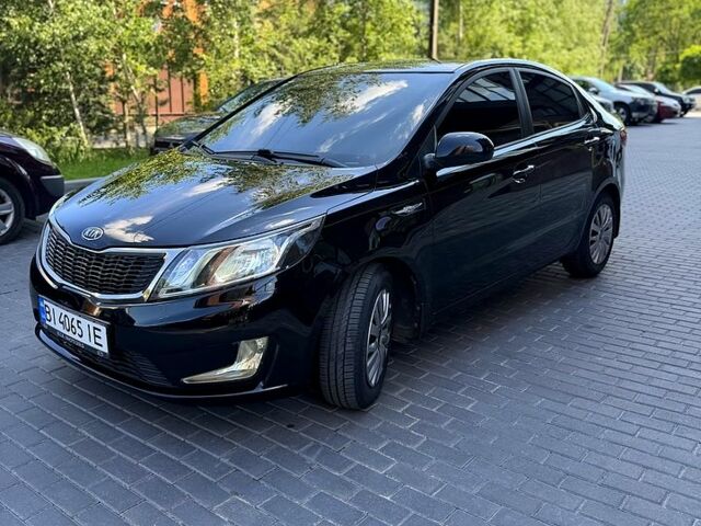 Чорний Кіа Ріо, об'ємом двигуна 1.4 л та пробігом 103 тис. км за 7800 $, фото 12 на Automoto.ua