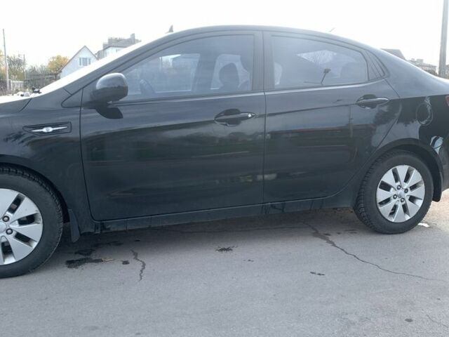 Чорний Кіа Ріо, об'ємом двигуна 1.4 л та пробігом 190 тис. км за 5500 $, фото 2 на Automoto.ua