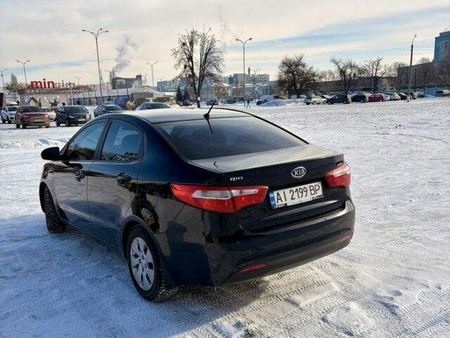 Чорний Кіа Ріо, об'ємом двигуна 1.6 л та пробігом 270 тис. км за 6499 $, фото 7 на Automoto.ua