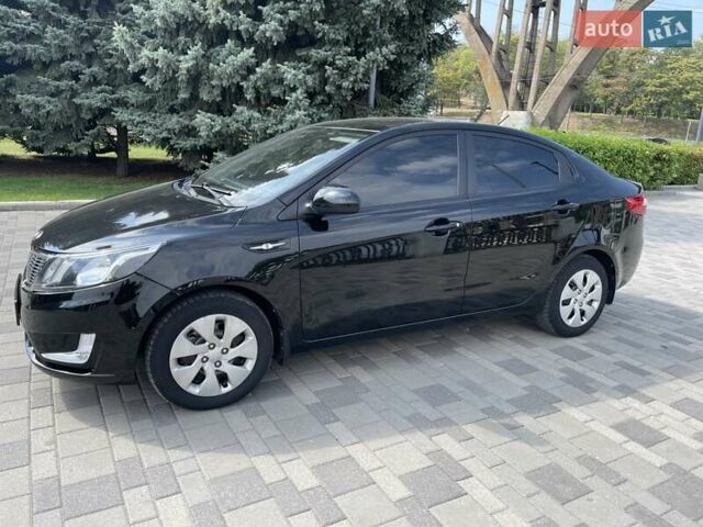 Черный Киа Рио, объемом двигателя 1.6 л и пробегом 127 тыс. км за 8300 $, фото 1 на Automoto.ua