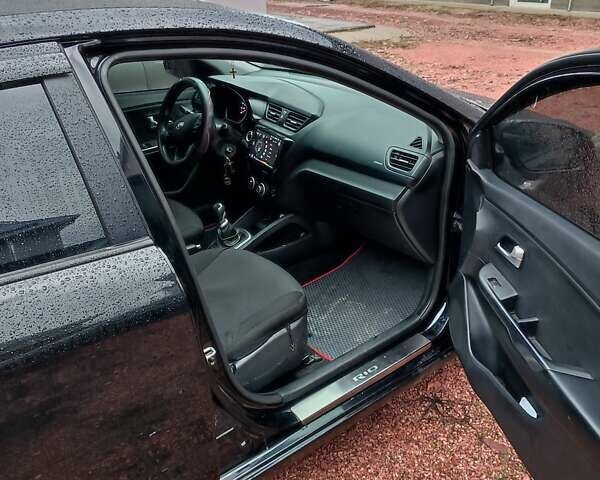 Черный Киа Рио, объемом двигателя 1.4 л и пробегом 170 тыс. км за 8500 $, фото 6 на Automoto.ua