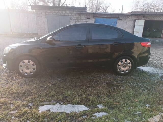 Черный Киа Рио, объемом двигателя 1.6 л и пробегом 180 тыс. км за 8200 $, фото 5 на Automoto.ua