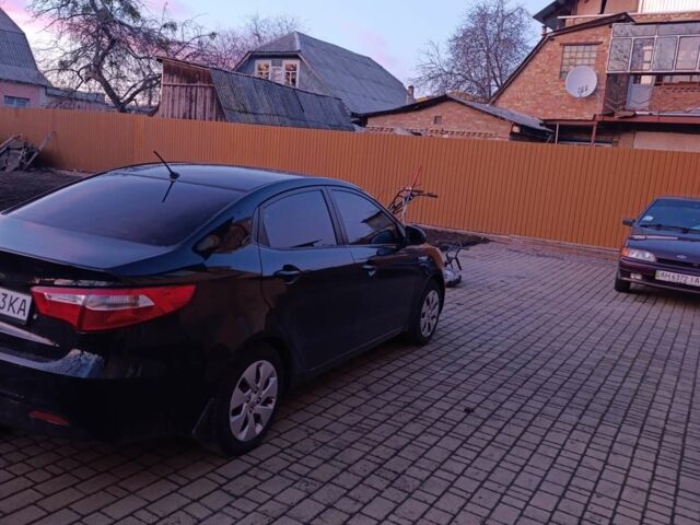 Чорний Кіа Ріо, об'ємом двигуна 1.4 л та пробігом 162 тис. км за 7500 $, фото 6 на Automoto.ua