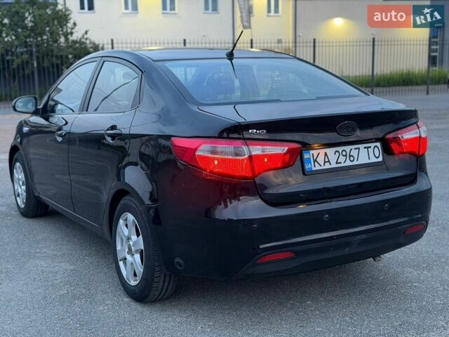 Чорний Кіа Ріо, об'ємом двигуна 1.4 л та пробігом 201 тис. км за 6950 $, фото 2 на Automoto.ua