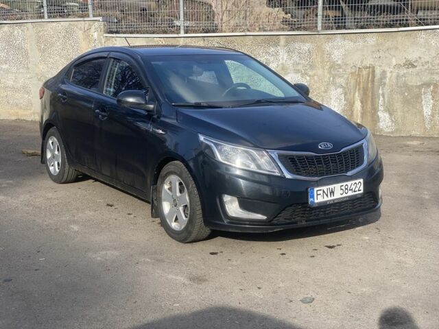 Чорний Кіа Ріо, об'ємом двигуна 1.6 л та пробігом 252 тис. км за 3650 $, фото 2 на Automoto.ua