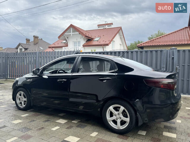 Чорний Кіа Ріо, об'ємом двигуна 1.4 л та пробігом 199 тис. км за 5999 $, фото 3 на Automoto.ua