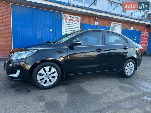 Чорний Кіа Ріо, об'ємом двигуна 1.59 л та пробігом 197 тис. км за 5888 $, фото 15 на Automoto.ua