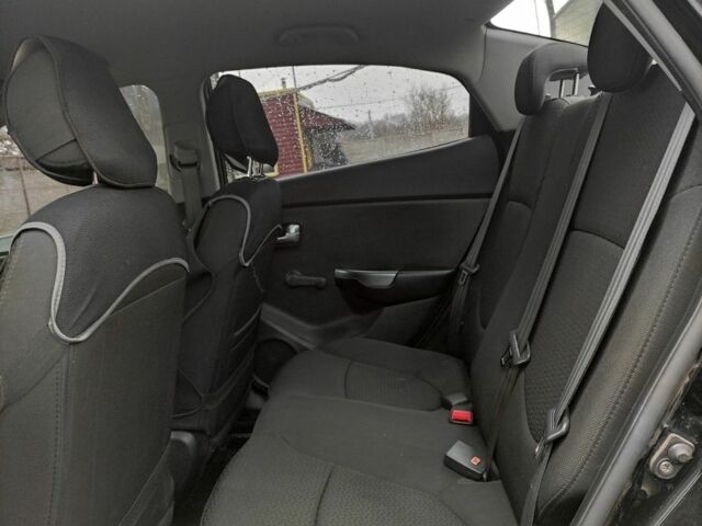 Черный Киа Рио, объемом двигателя 1.4 л и пробегом 94 тыс. км за 6500 $, фото 1 на Automoto.ua