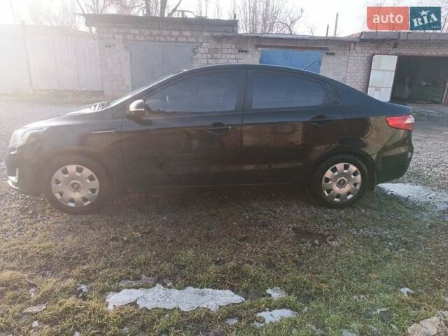 Черный Киа Рио, объемом двигателя 1.59 л и пробегом 178 тыс. км за 8400 $, фото 5 на Automoto.ua