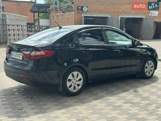 Черный Киа Рио, объемом двигателя 1.4 л и пробегом 155 тыс. км за 7500 $, фото 10 на Automoto.ua