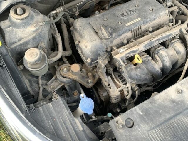 Чорний Кіа Ріо, об'ємом двигуна 1.4 л та пробігом 190 тис. км за 5500 $, фото 7 на Automoto.ua