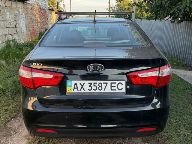 Чорний Кіа Ріо, об'ємом двигуна 1.4 л та пробігом 73 тис. км за 8900 $, фото 6 на Automoto.ua