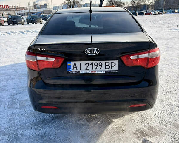 Черный Киа Рио, объемом двигателя 1.6 л и пробегом 270 тыс. км за 6650 $, фото 5 на Automoto.ua