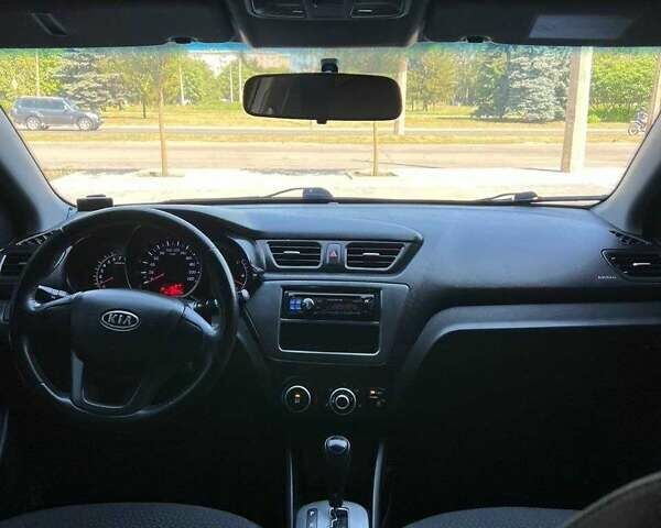 Чорний Кіа Ріо, об'ємом двигуна 1.4 л та пробігом 100 тис. км за 7607 $, фото 5 на Automoto.ua