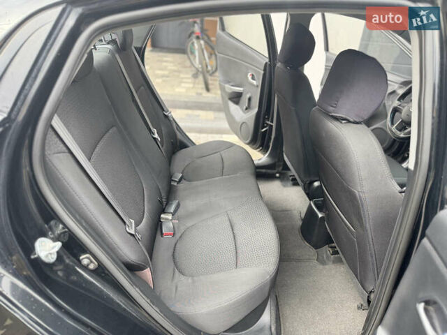 Чорний Кіа Ріо, об'ємом двигуна 1.4 л та пробігом 199 тис. км за 5999 $, фото 18 на Automoto.ua