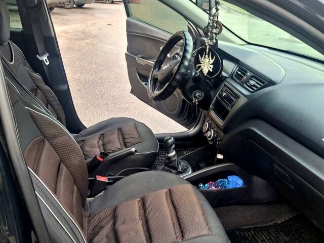 Черный Киа Рио, объемом двигателя 1.4 л и пробегом 197 тыс. км за 7000 $, фото 9 на Automoto.ua