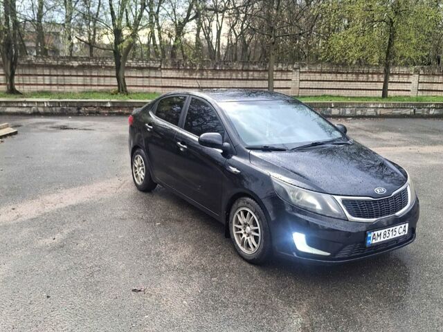 Черный Киа Рио, объемом двигателя 1.4 л и пробегом 197 тыс. км за 7000 $, фото 2 на Automoto.ua