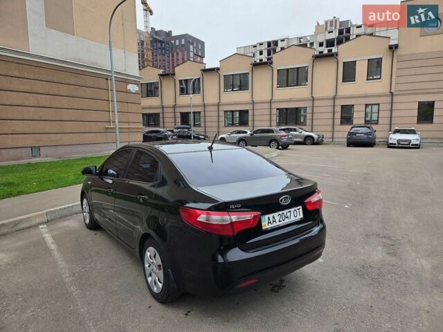 Чорний Кіа Ріо, об'ємом двигуна 1.6 л та пробігом 215 тис. км за 7500 $, фото 1 на Automoto.ua