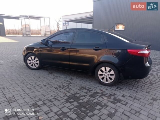 Черный Киа Рио, объемом двигателя 1.6 л и пробегом 285 тыс. км за 7800 $, фото 11 на Automoto.ua