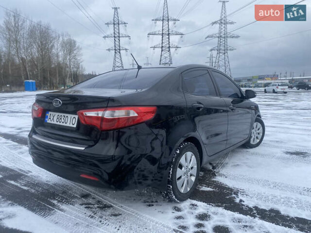 Черный Киа Рио, объемом двигателя 1.59 л и пробегом 249 тыс. км за 6900 $, фото 4 на Automoto.ua