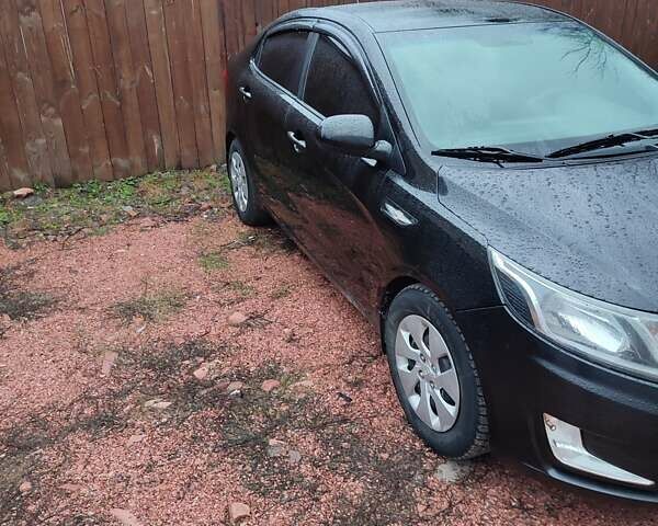 Черный Киа Рио, объемом двигателя 1.4 л и пробегом 170 тыс. км за 8500 $, фото 7 на Automoto.ua