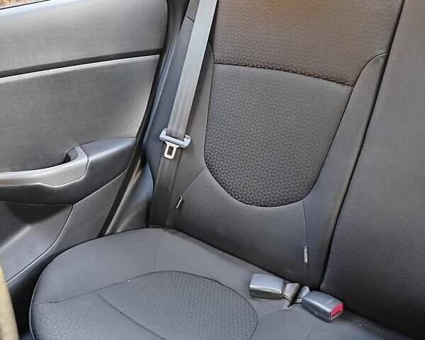 Чорний Кіа Ріо, об'ємом двигуна 1.4 л та пробігом 95 тис. км за 7000 $, фото 6 на Automoto.ua