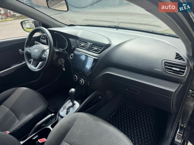 Черный Киа Рио, объемом двигателя 1.4 л и пробегом 155 тыс. км за 7500 $, фото 24 на Automoto.ua