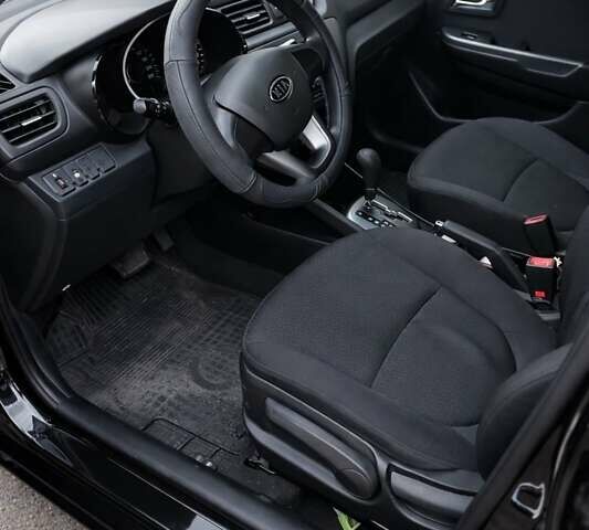 Чорний Кіа Ріо, об'ємом двигуна 1.59 л та пробігом 144 тис. км за 8700 $, фото 3 на Automoto.ua
