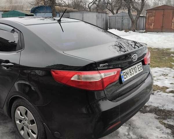 Чорний Кіа Ріо, об'ємом двигуна 1.4 л та пробігом 92 тис. км за 7200 $, фото 9 на Automoto.ua