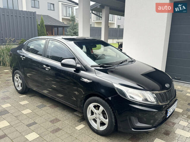 Чорний Кіа Ріо, об'ємом двигуна 1.4 л та пробігом 199 тис. км за 5999 $, фото 9 на Automoto.ua