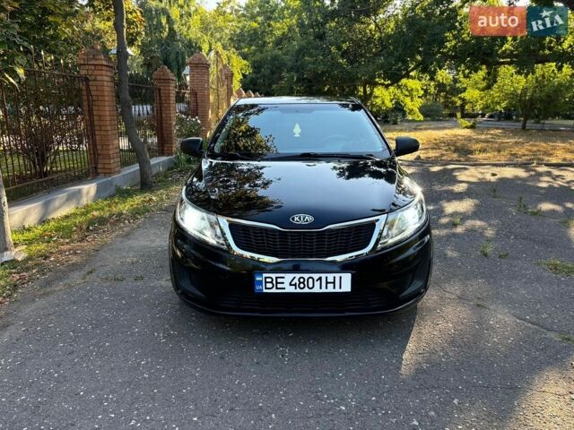 Чорний Кіа Ріо, об'ємом двигуна 1.4 л та пробігом 165 тис. км за 6900 $, фото 12 на Automoto.ua