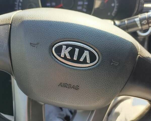 Чорний Кіа Ріо, об'ємом двигуна 1.4 л та пробігом 162 тис. км за 7500 $, фото 3 на Automoto.ua