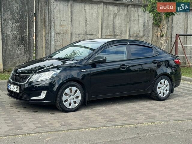Черный Киа Рио, объемом двигателя 1.4 л и пробегом 155 тыс. км за 7500 $, фото 1 на Automoto.ua