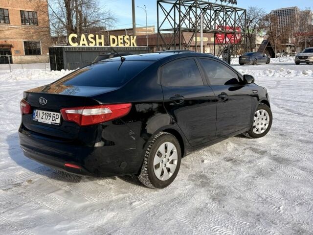 Чорний Кіа Ріо, об'ємом двигуна 1.6 л та пробігом 270 тис. км за 6499 $, фото 5 на Automoto.ua