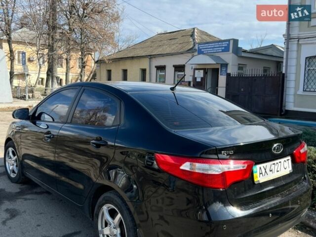 Черный Киа Рио, объемом двигателя 1.6 л и пробегом 103 тыс. км за 7800 $, фото 4 на Automoto.ua