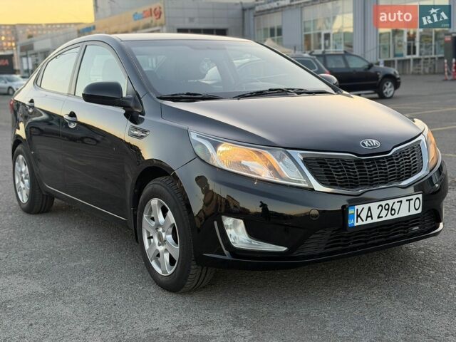 Черный Киа Рио, объемом двигателя 1.4 л и пробегом 201 тыс. км за 6900 $, фото 6 на Automoto.ua