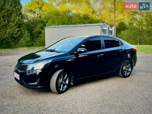 Черный Киа Рио, объемом двигателя 1.4 л и пробегом 95 тыс. км за 7299 $, фото 5 на Automoto.ua